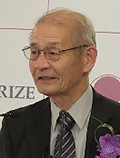 Dr. Akira Yoshino expressing joy at the press conference