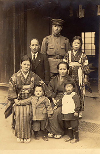 A family photo - second from left is little Satoshi